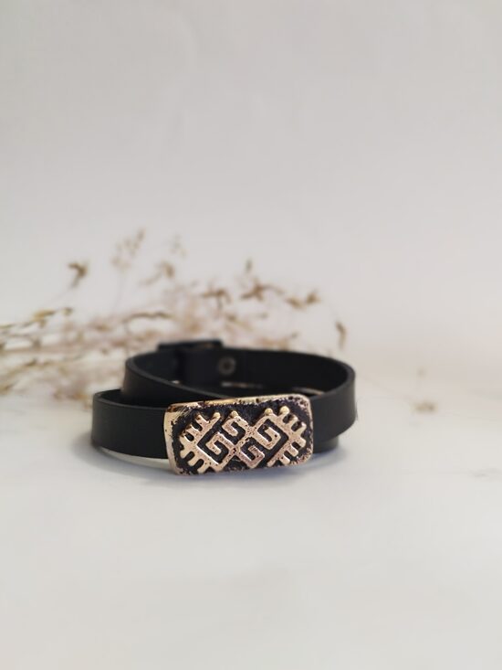 Ādas aproce ar bronzas zalkša zīmi